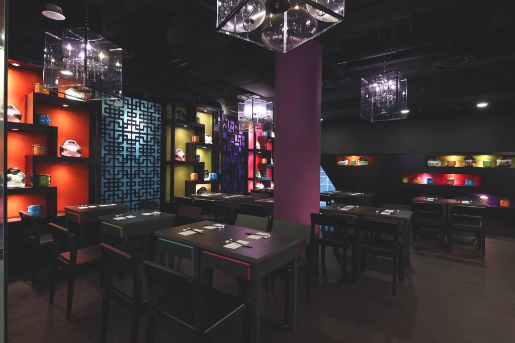 Isshi Ramen restaurant interior design dining counter with overhead lighting